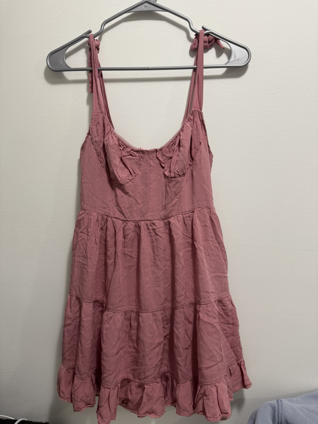 Pink tiered mini dress with ruffle details
