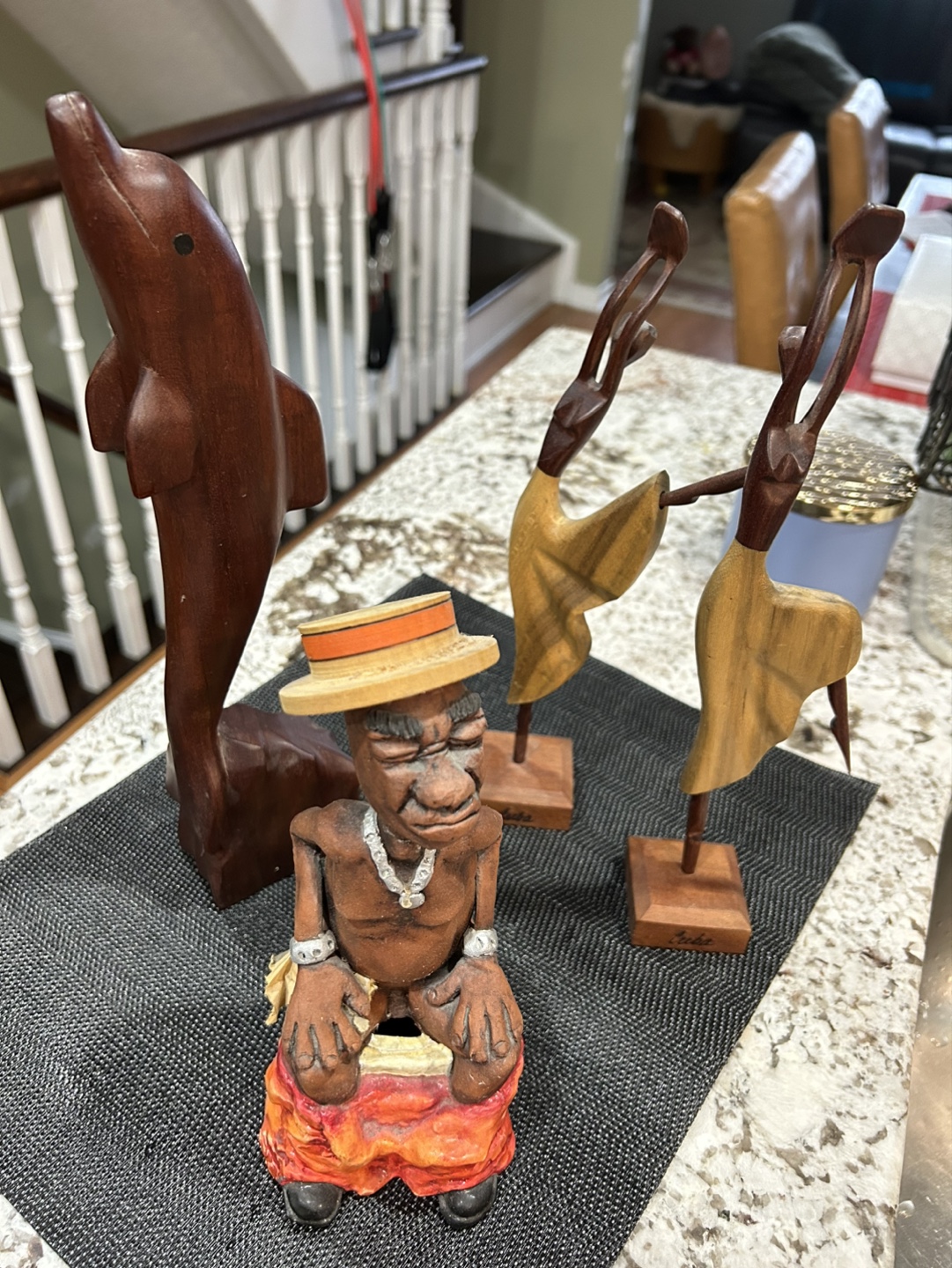 Wooden Figurines: Dolphin, Man, and Dancers