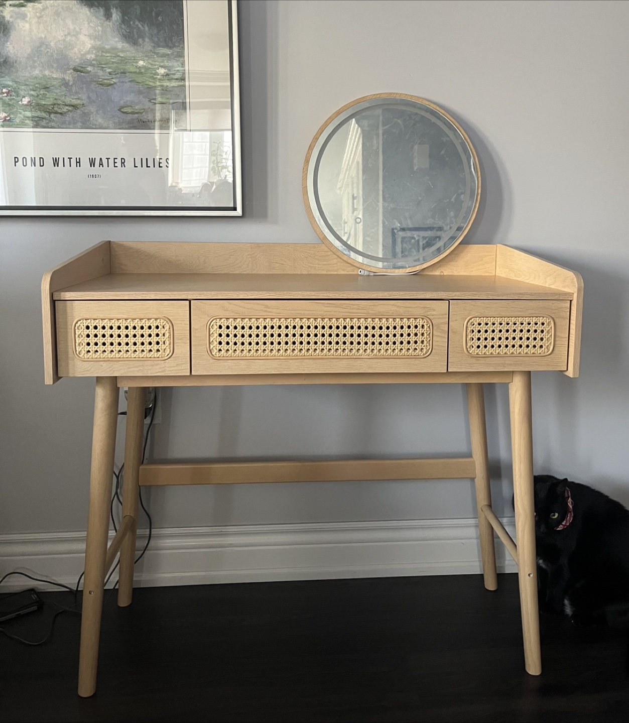 Vanity Desk with Rattan Accents and Lighted Mirror