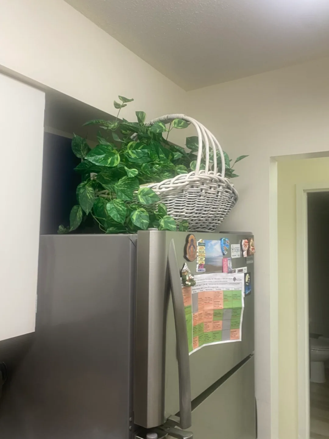 White Wicker Basket with Artificial Plants image indicator(6)