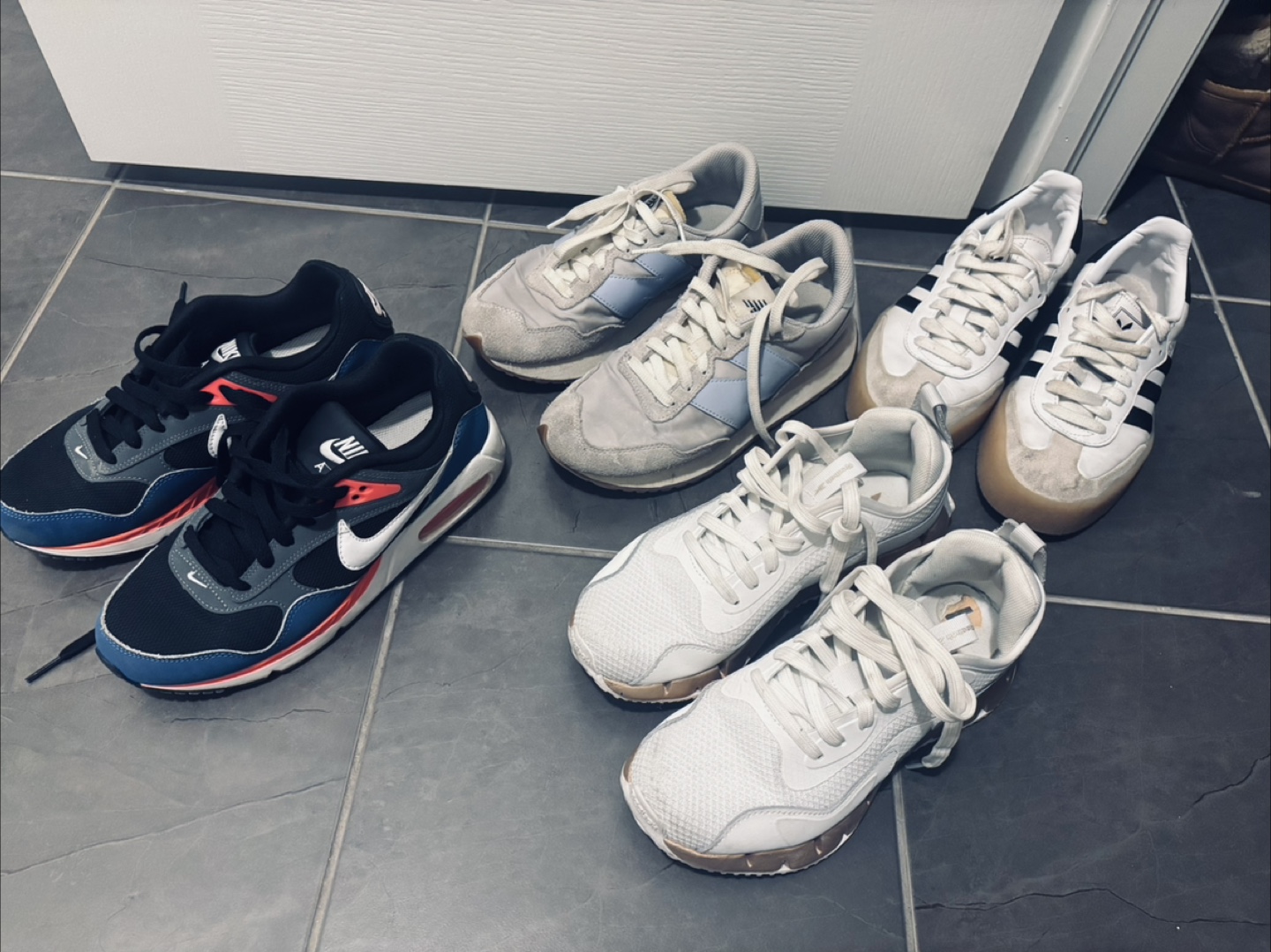 Bundle of four pairs of used sneakers