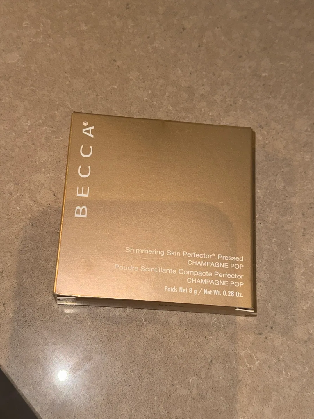 BECCA Shimmering Skin Perfector Pressed Powder in Champagne Pop image indicator(2)