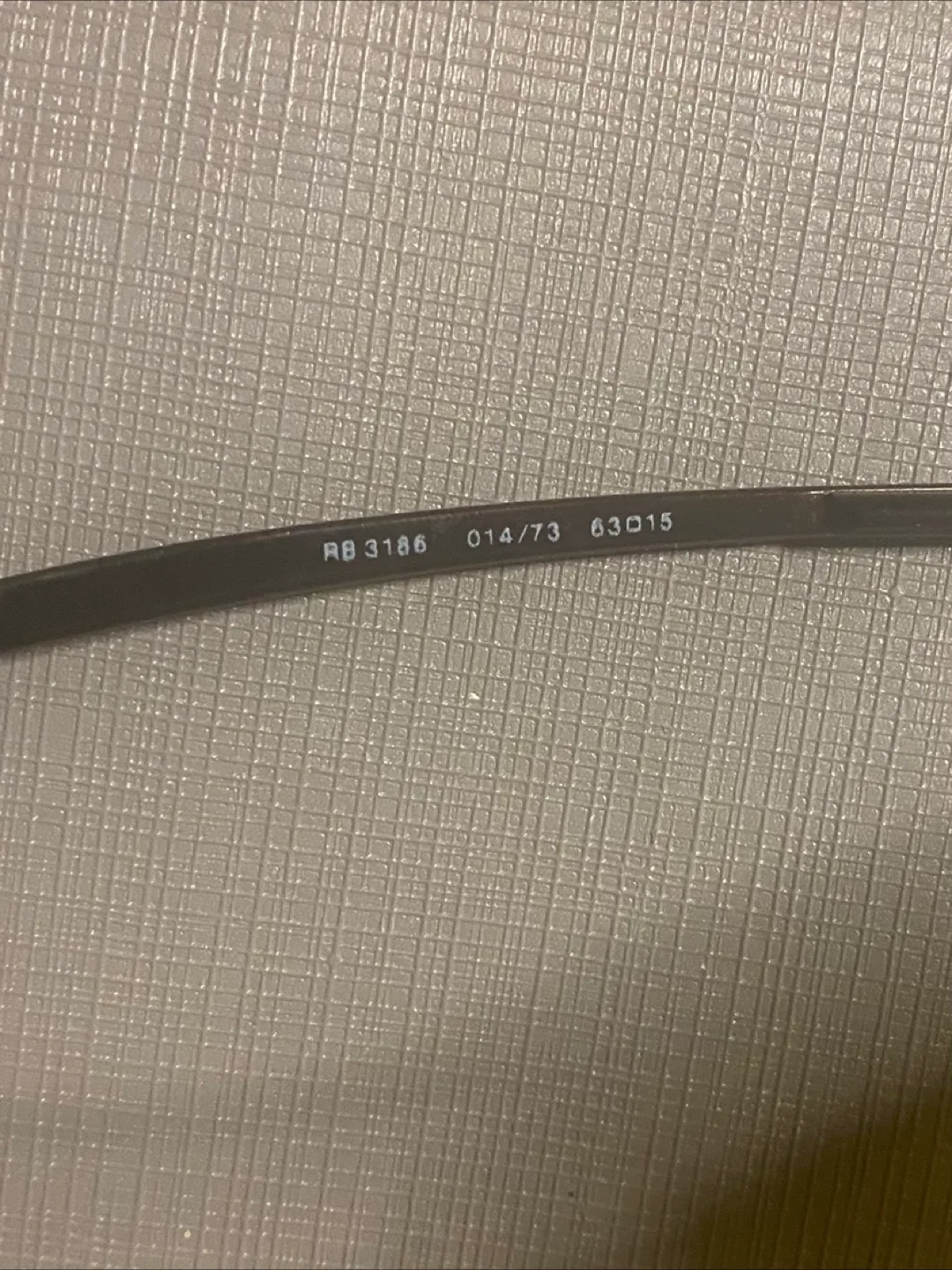 RAY BAN ITALY Sleek Brown Half Rimless Wrap Sunglasses image indicator(6)