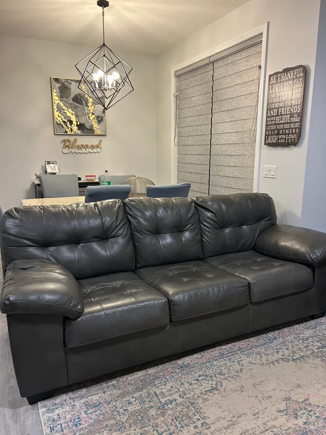 Dark Grey Leather Sofa with Leaf Print Slipcover thumbnail