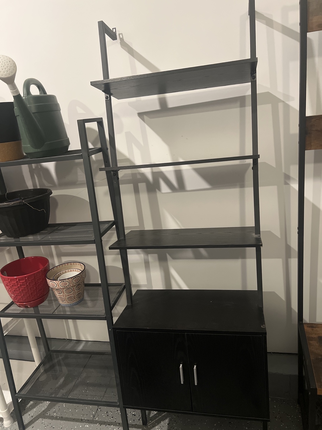Black Metal and Wood Ladder Shelf with Cabinet