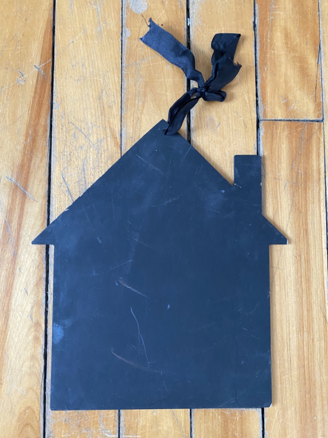 House-shaped chalkboard sign