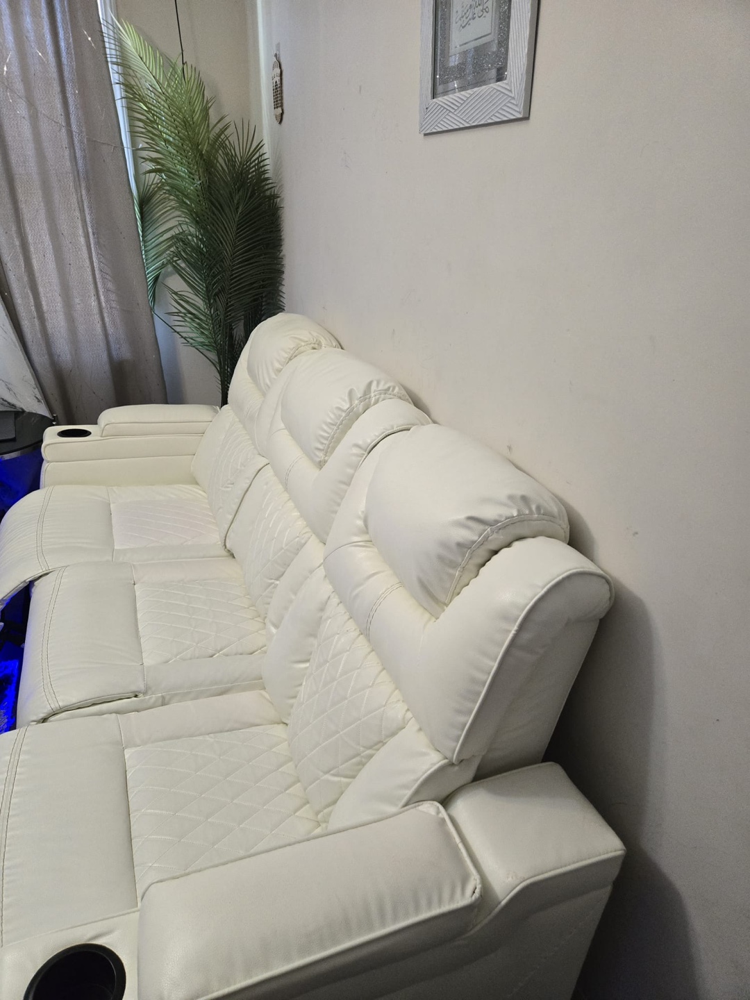White Leather Reclining Sofa with Center Console