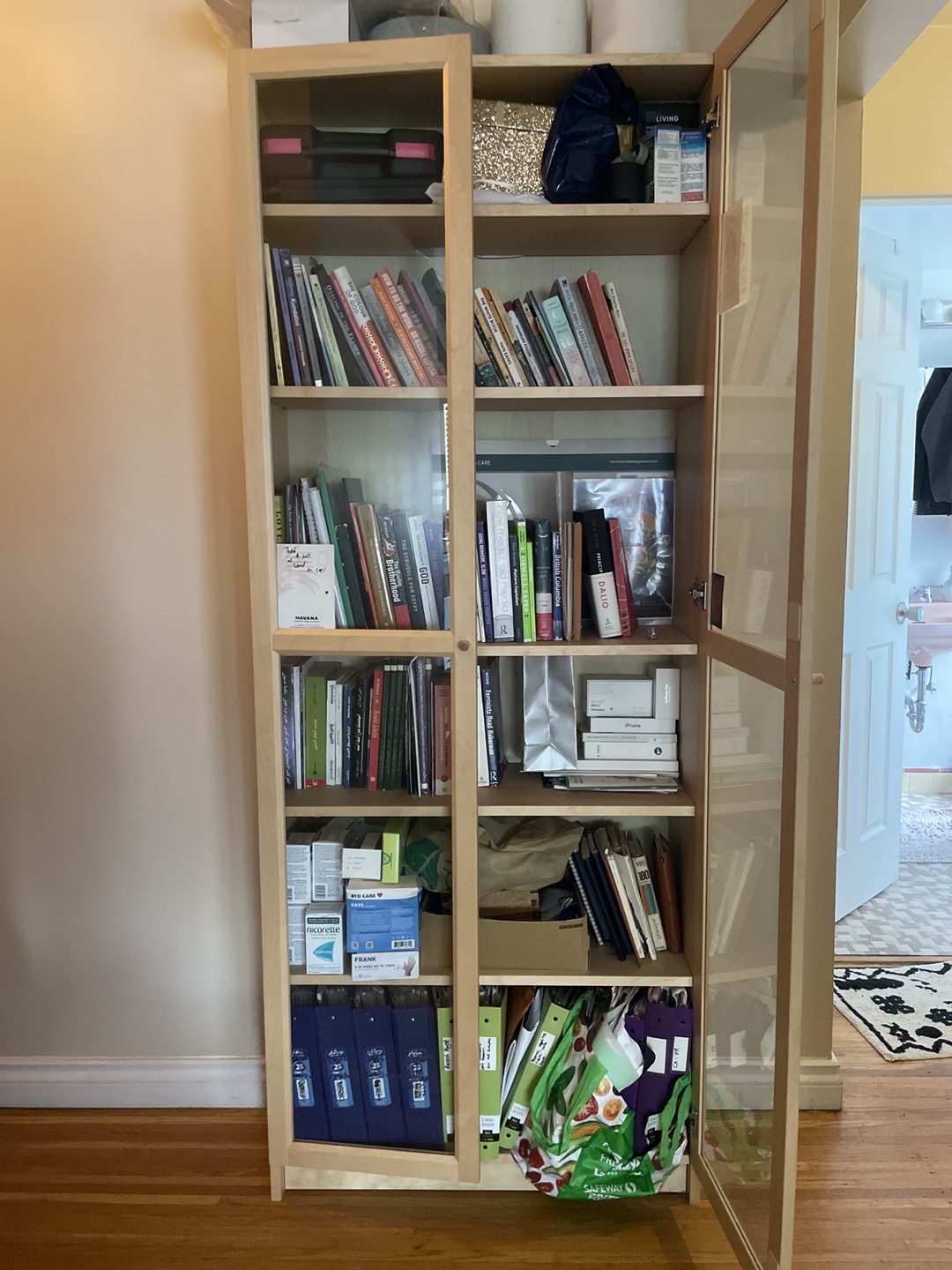 IKEA Wooden bookcase with glass doors