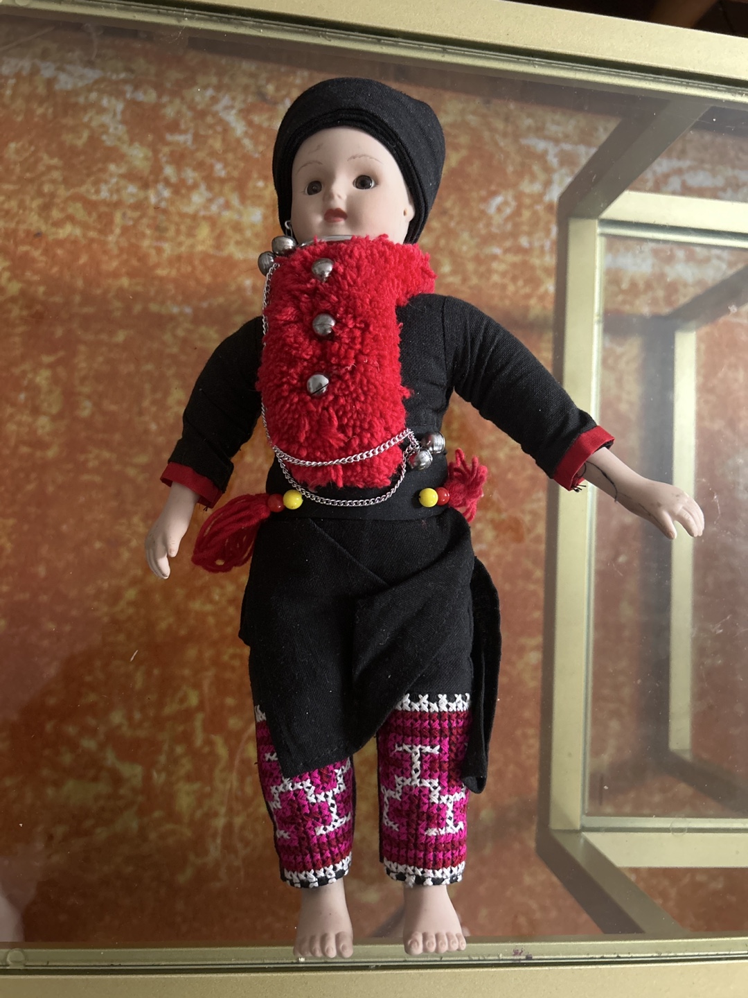 Collectible Porcelain Doll in Traditional Clothing
