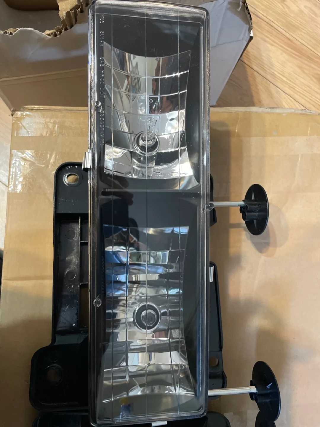 New L & R Headlight assemblies still in packaging with adjusters image indicator(4)