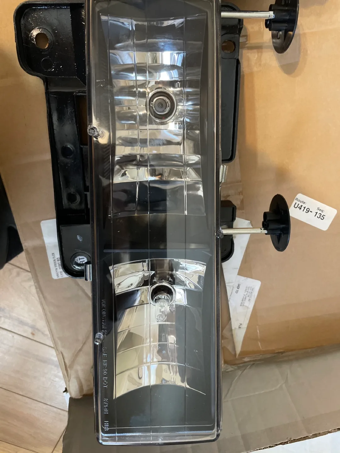 New L & R Headlight assemblies still in packaging with adjusters image indicator(3)