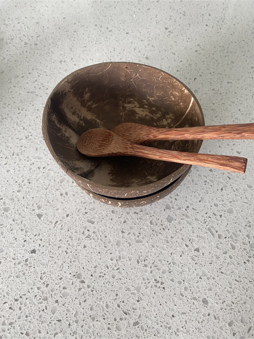 Set of Two Coconut Bowls with Wooden Spoons