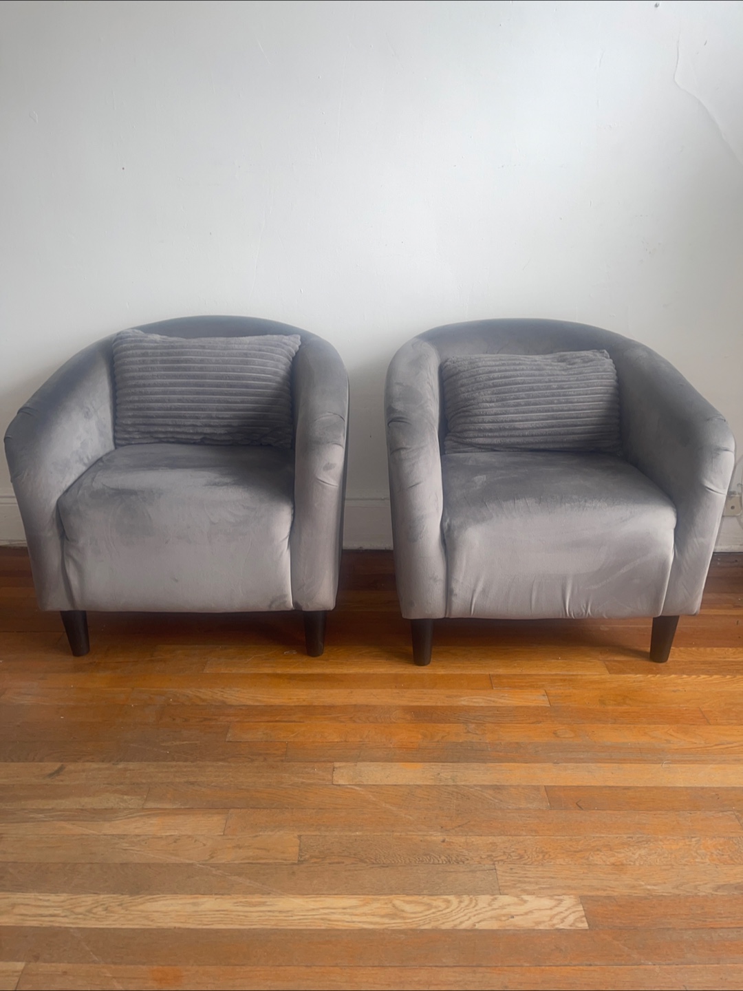 Pair of Gray Velvet Accent Chairs with Pillows