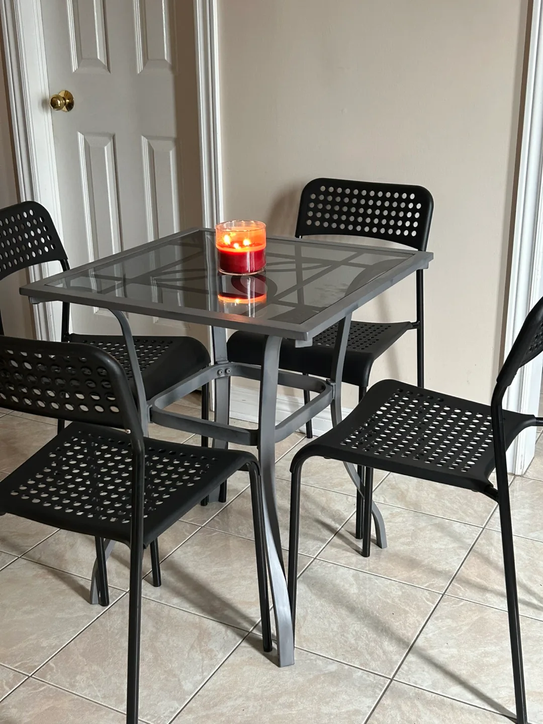 Four Black Plastic Chairs , Indoor / outdoor image indicator(3)