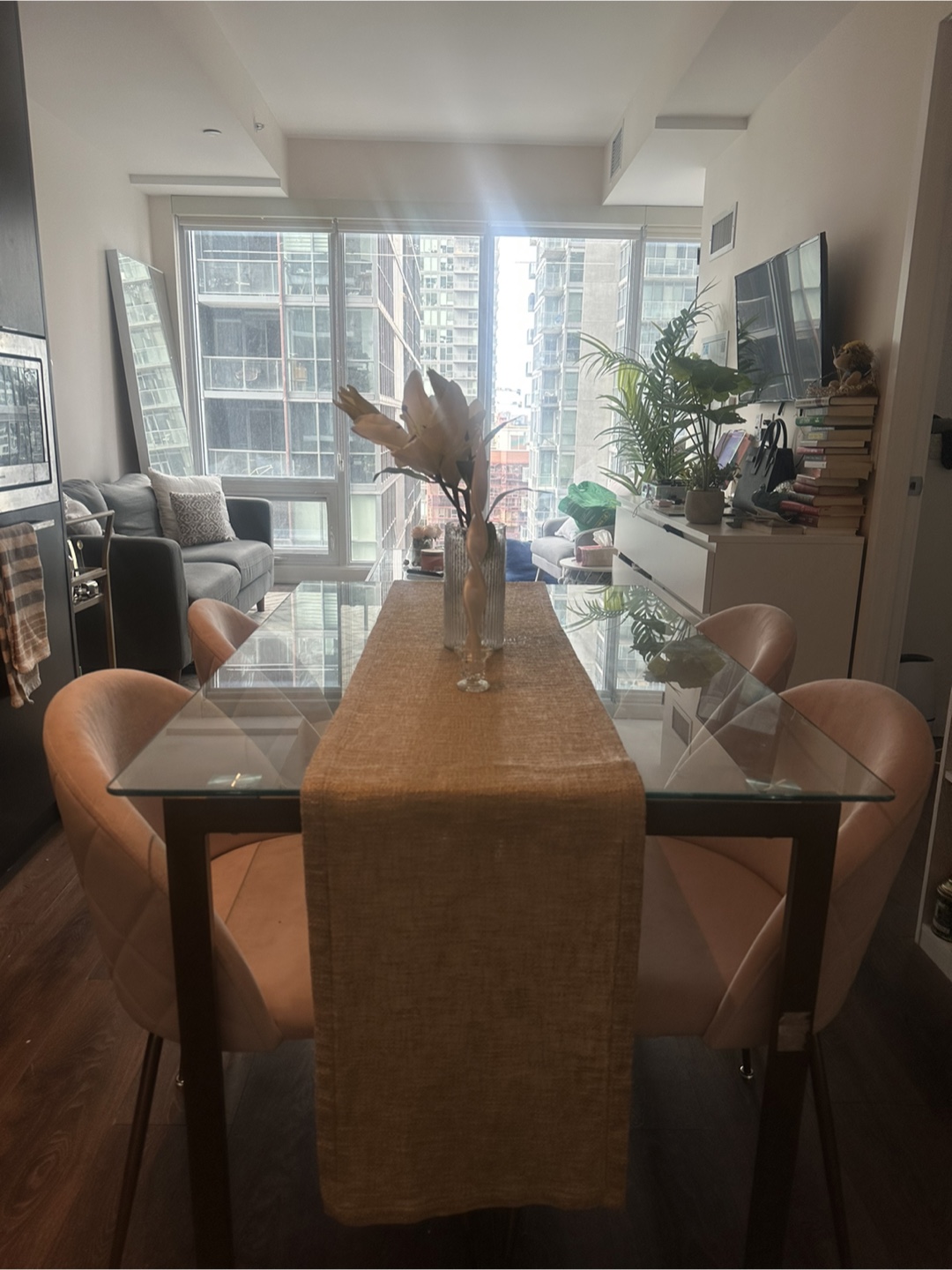 Glass-top dining table with four blush pink velvet chairs - photo 3