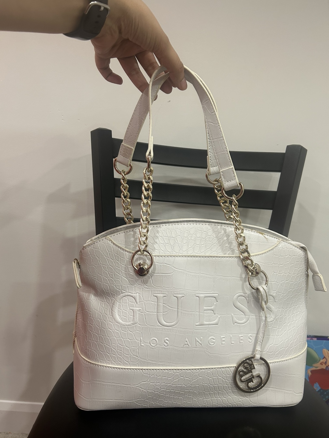 White Guess handbag with gold chain straps