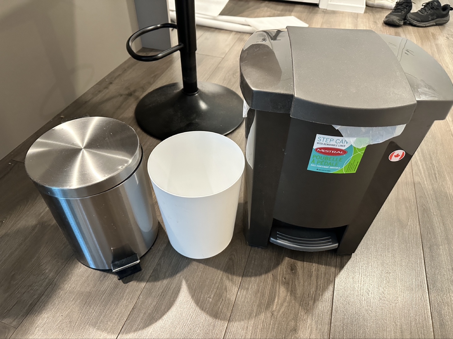 Three trash cans