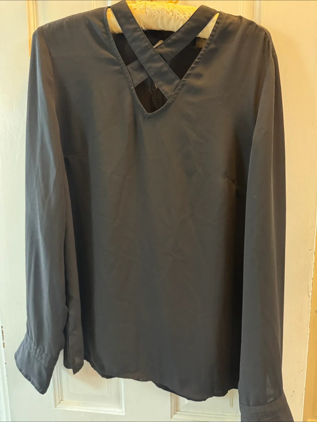 Black long sleeve criss-cross blouse thumbnail