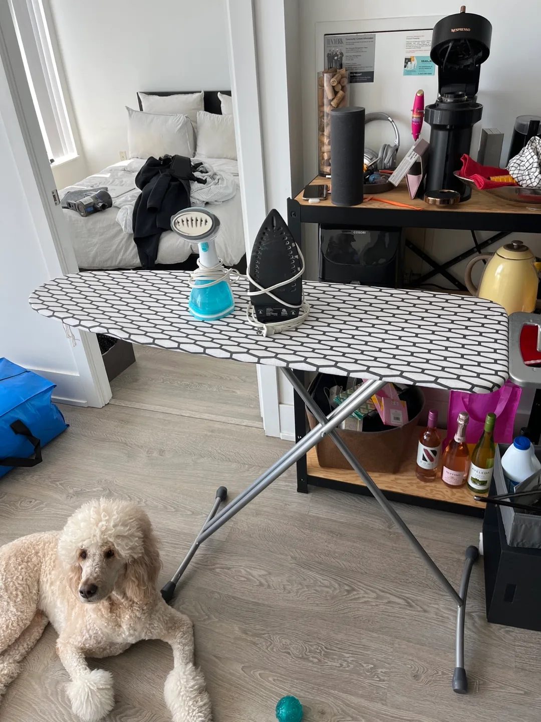 Ironing board with steam iron and handheld steamer thumbnail