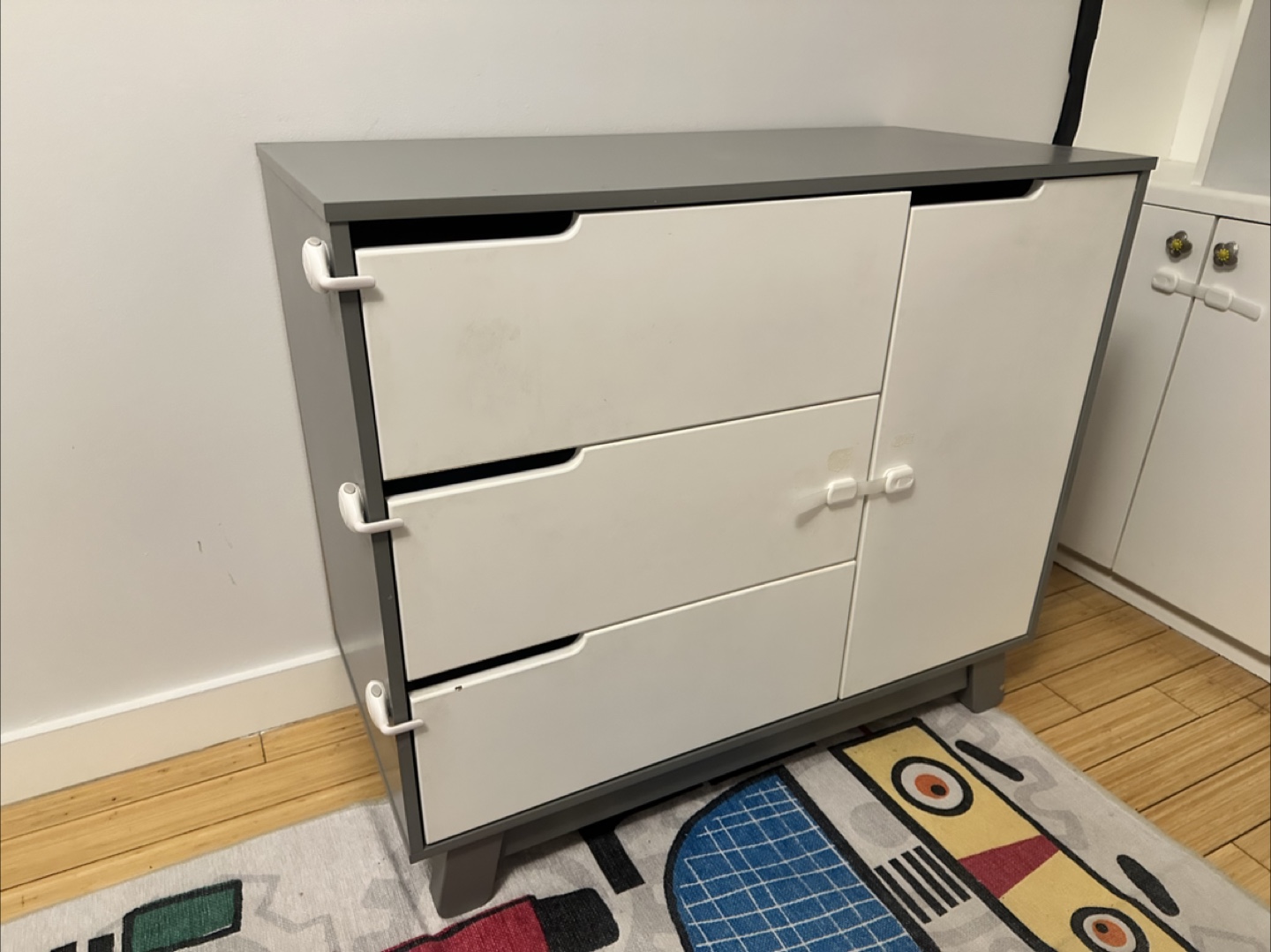 Child's dresser with three drawers and cabinet
