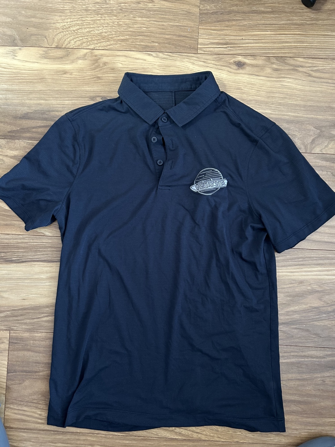 Lululemon Blue Evolutoon Polo - Canucks