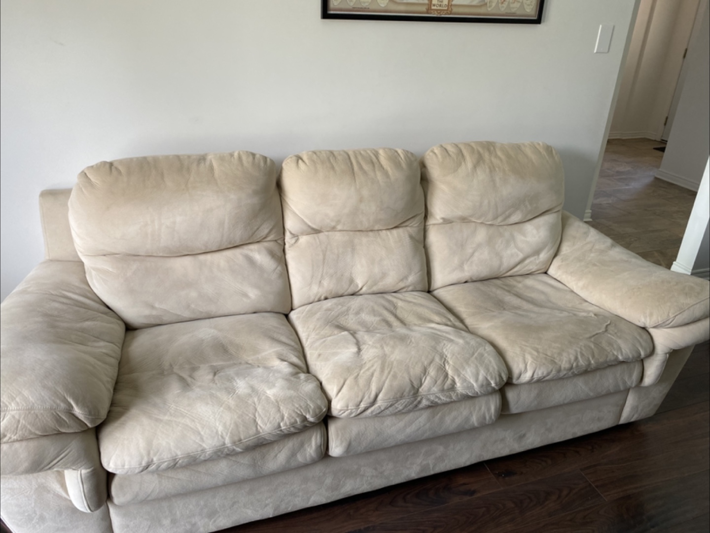 Beige Three-Seater Sofa - Selling it because we’re moving out.