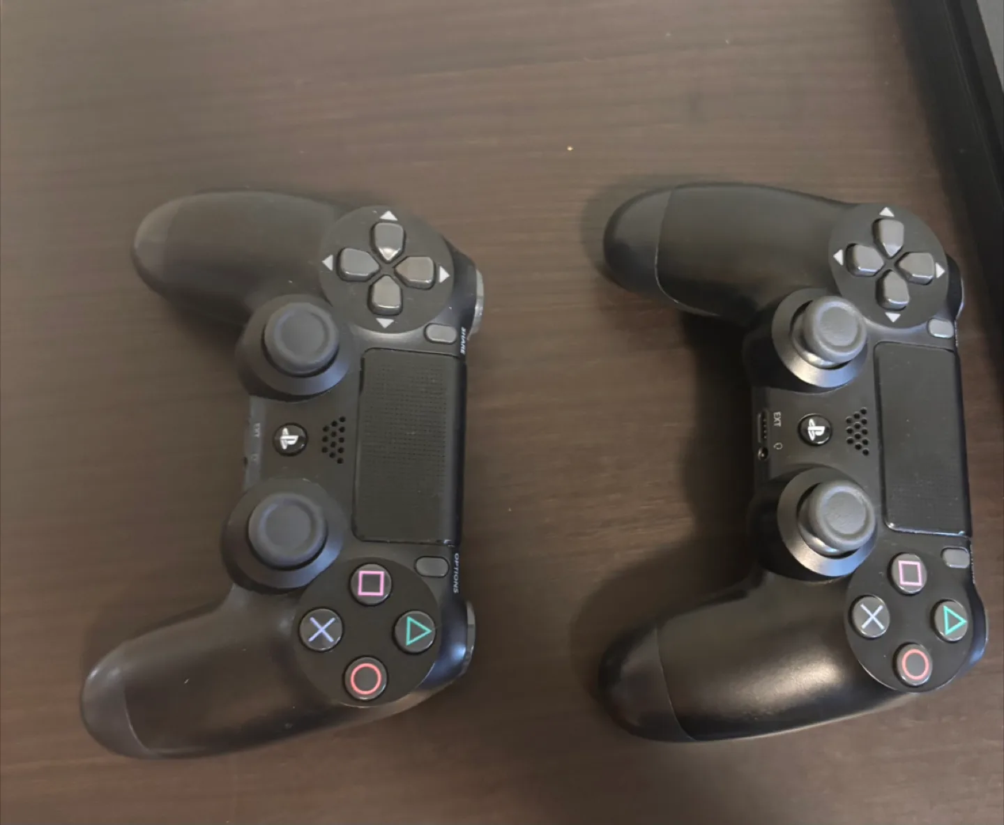 PS4 Slim Console with Two Controllers image indicator(2)