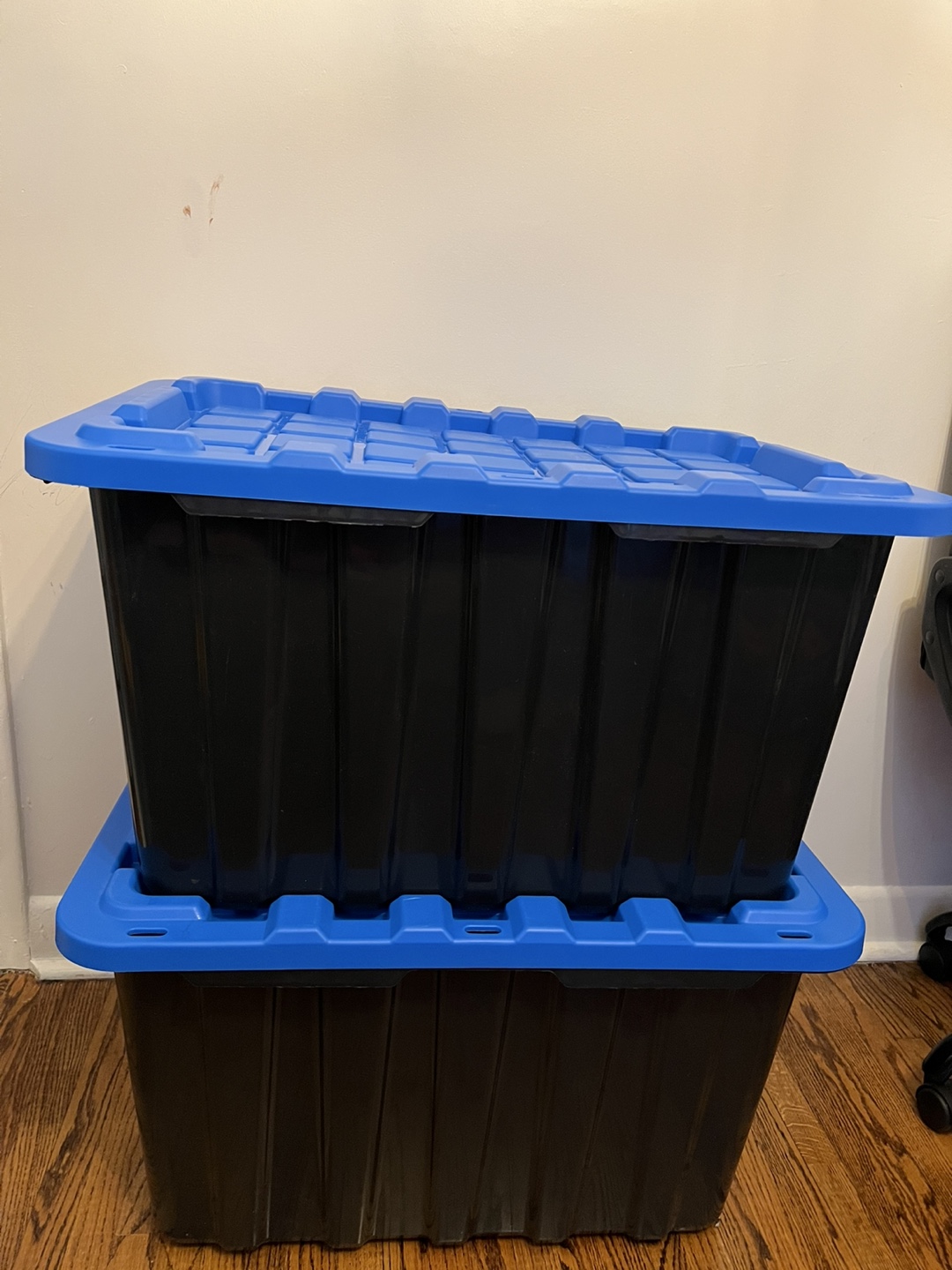 Two Black Storage Bins with Blue Lids
