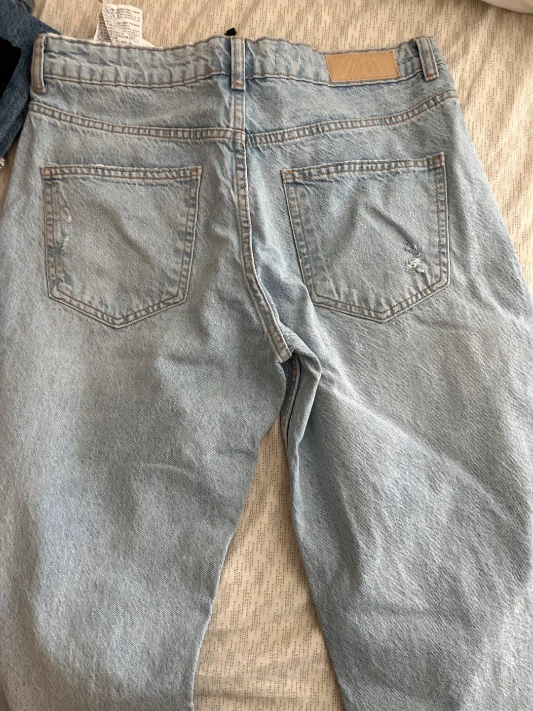Zara Light Wash Distressed Jeans image indicator(4)