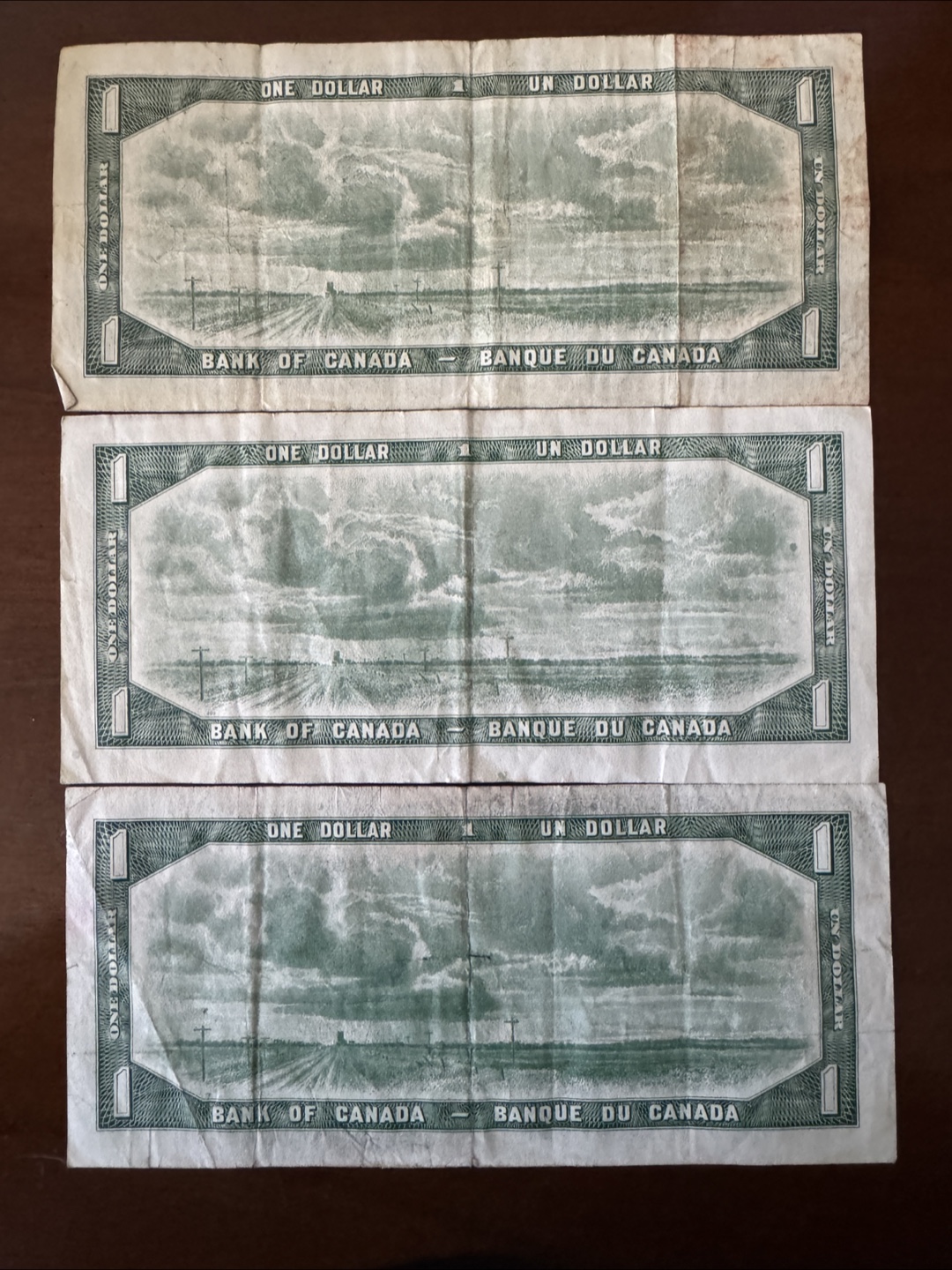 Three 1954 One Canadian Dollar Bills - photo 2