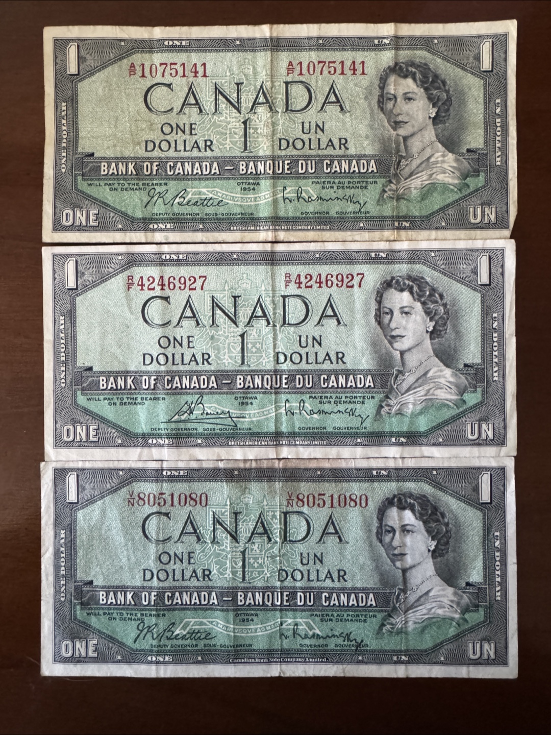 Three 1954 One Canadian Dollar Bills
