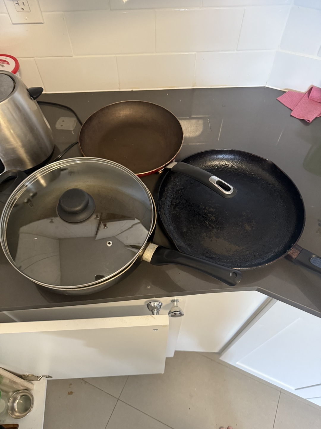 2 frying pans and saucepan