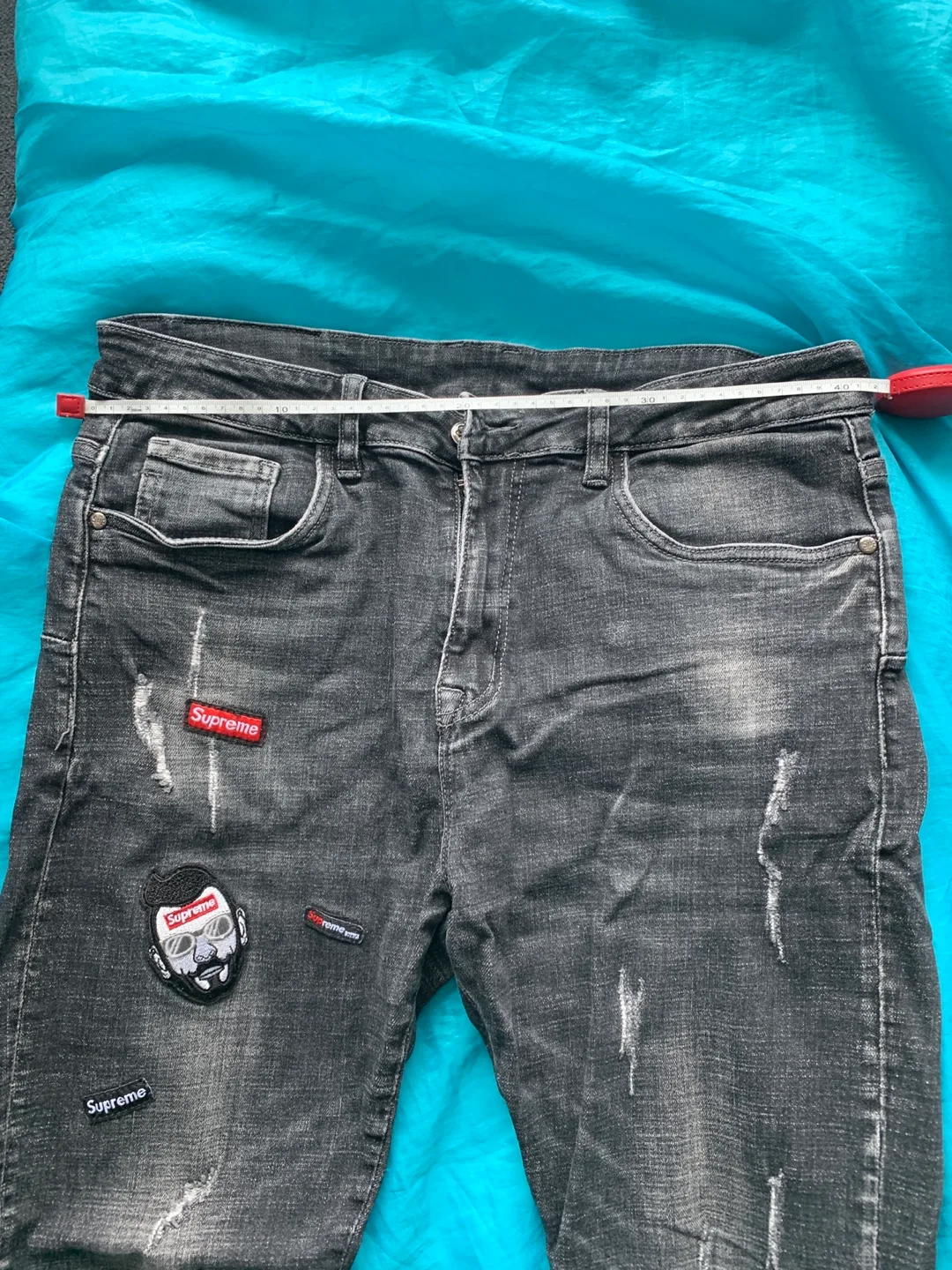 Men's Distressed Black Jeans with Supreme Patches image indicator(4)