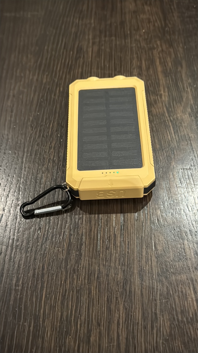Solar charger with dual flashlight
