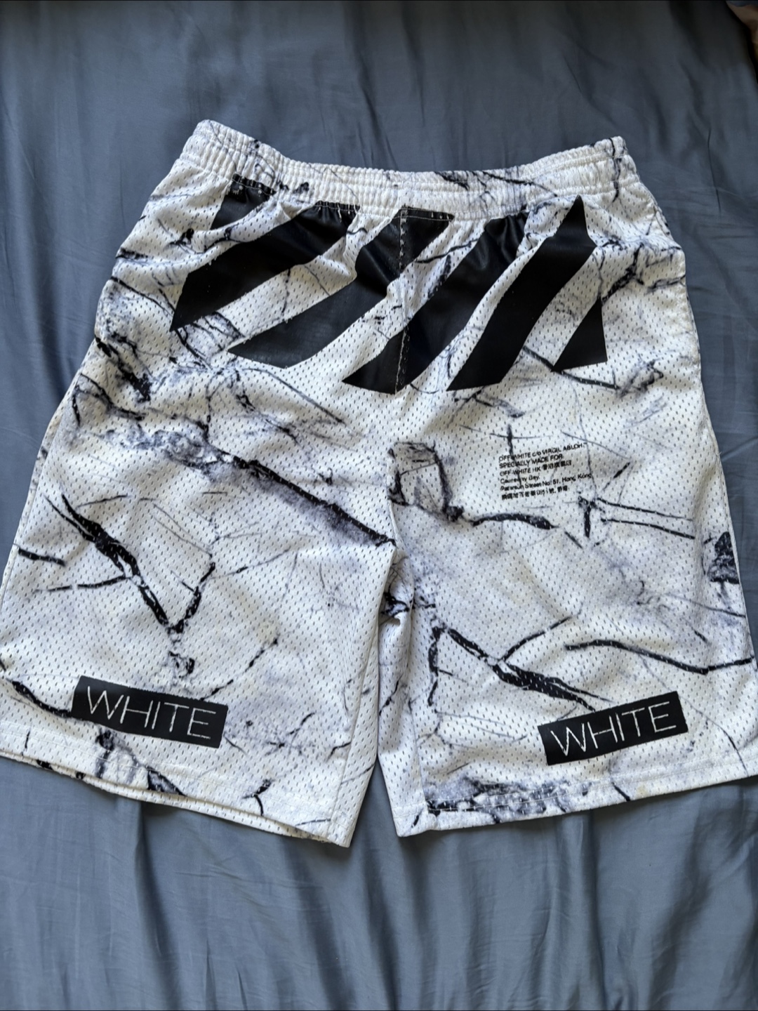 Off-White Marble Print Mesh Shorts