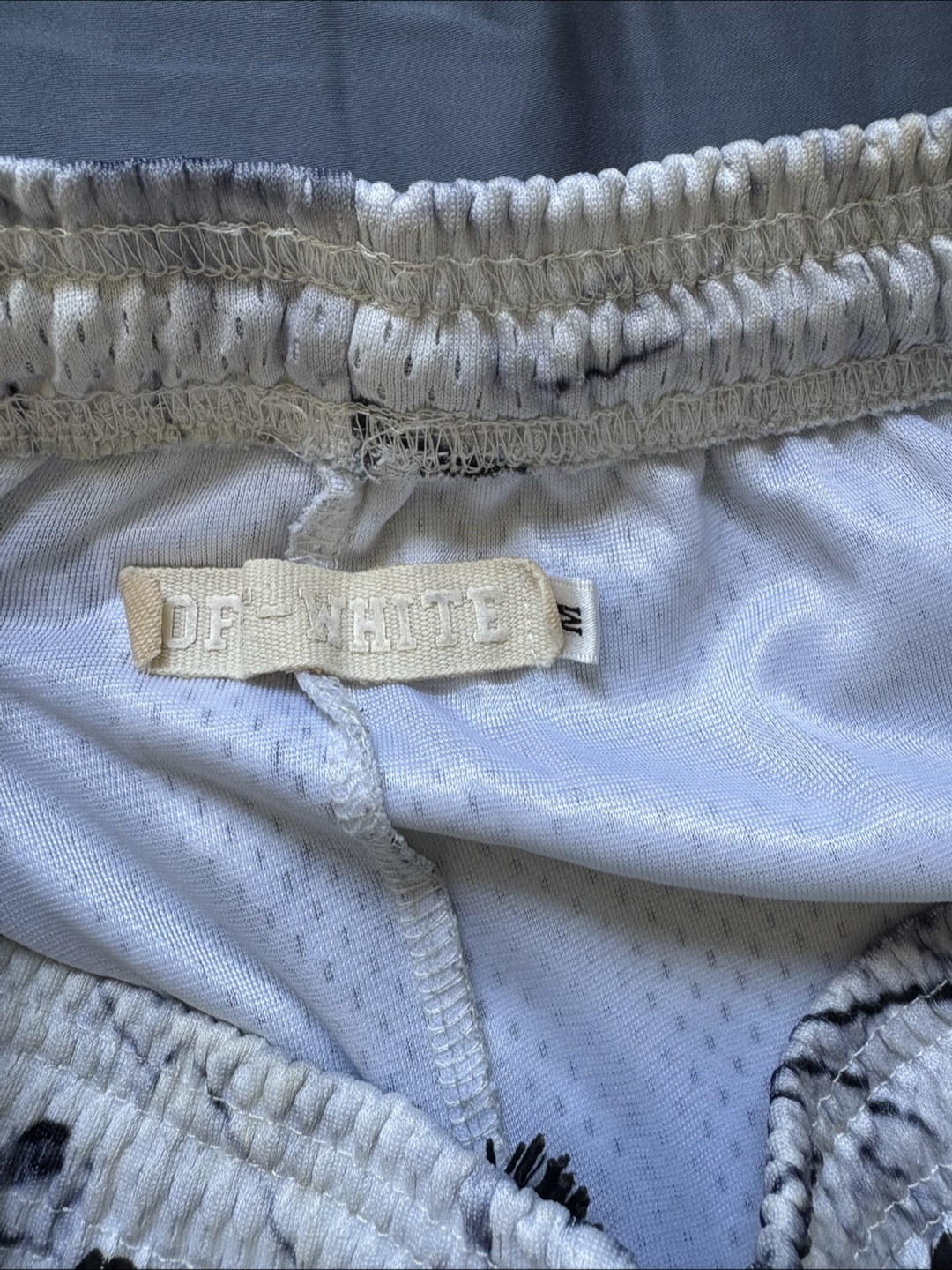 Off-White Marble Print Mesh Shorts - photo 4