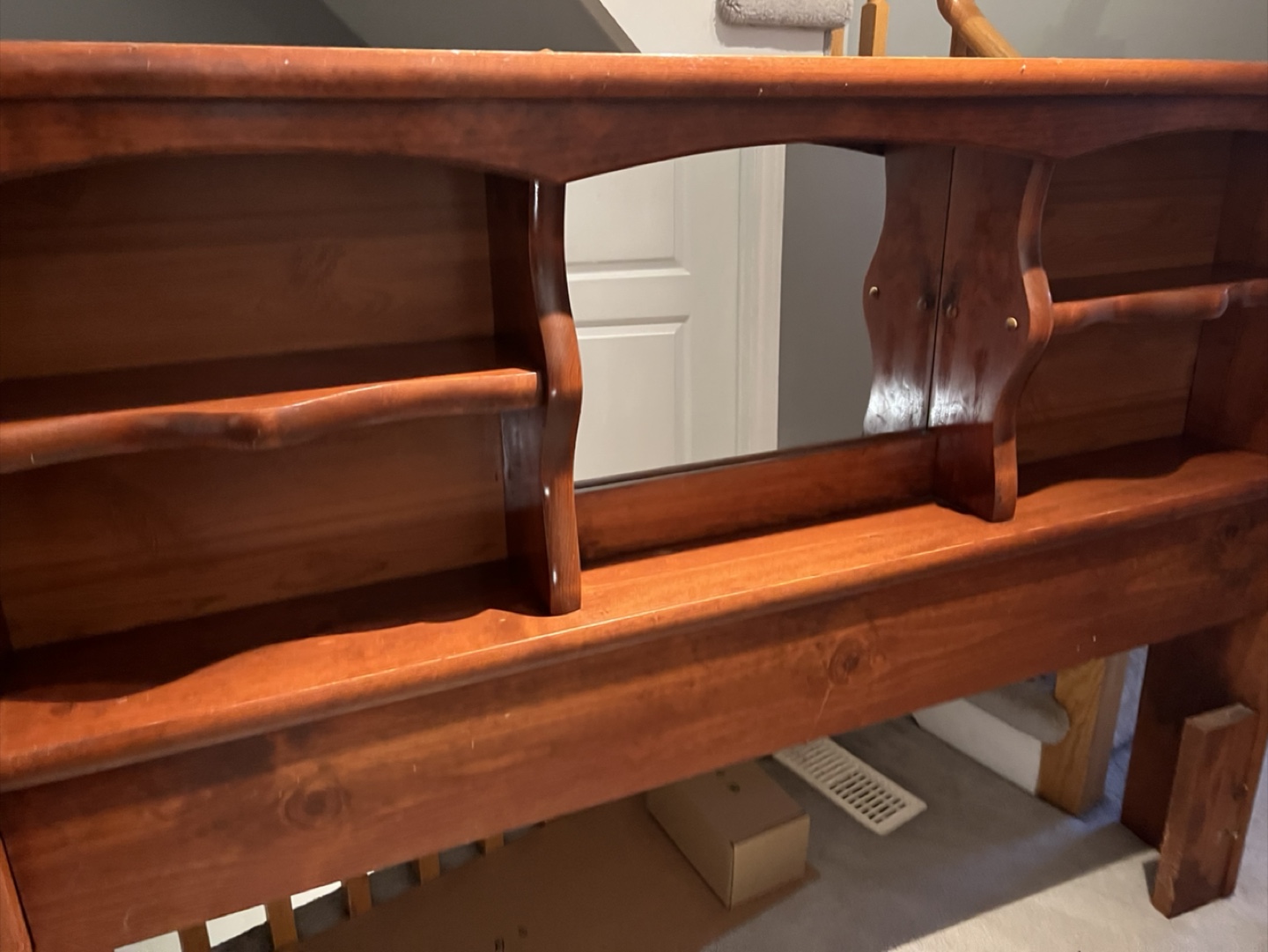 Wooden headboard with shelves