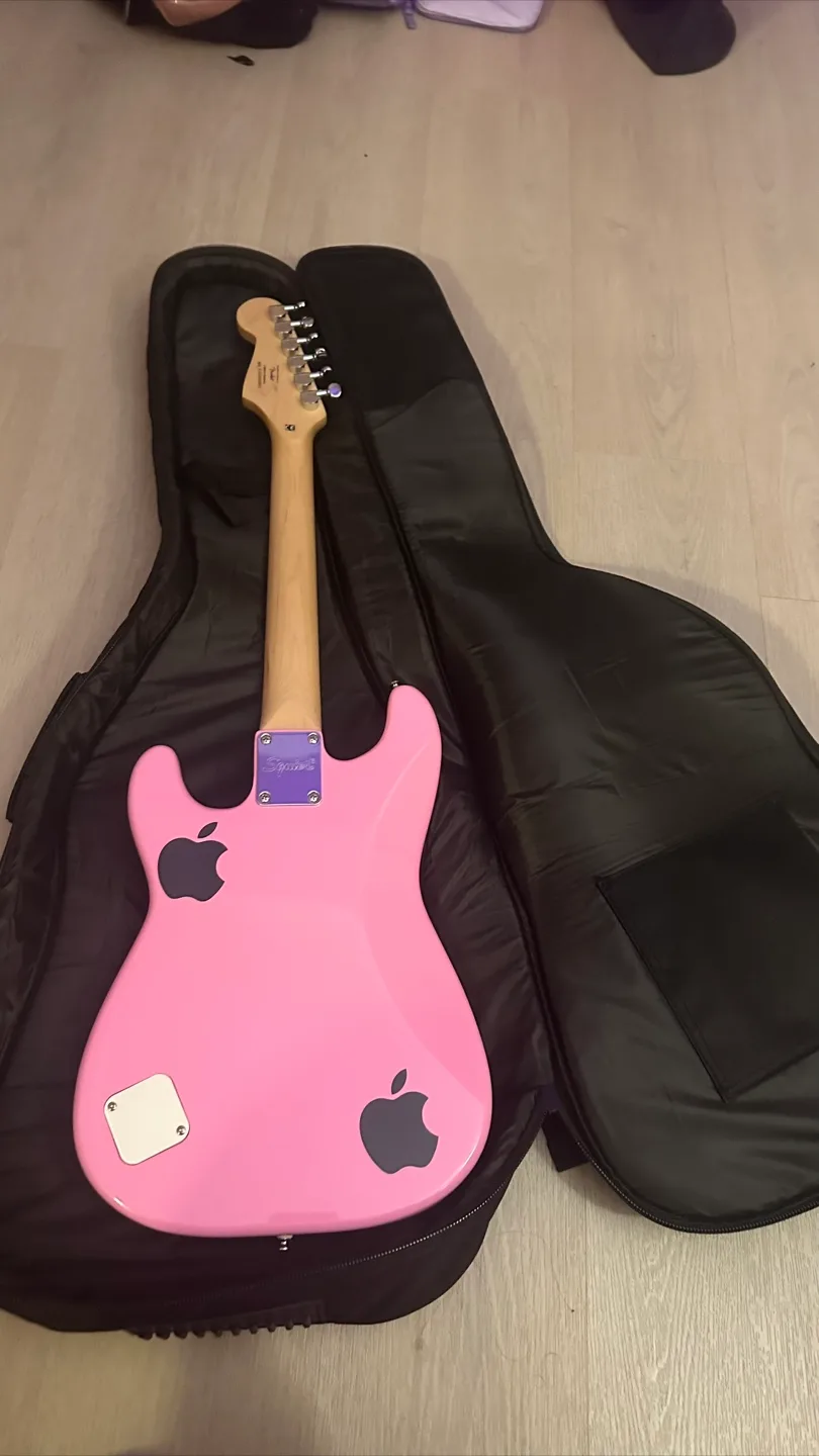 Pink Electric Guitar with Stickers and Gig Bag image indicator(2)