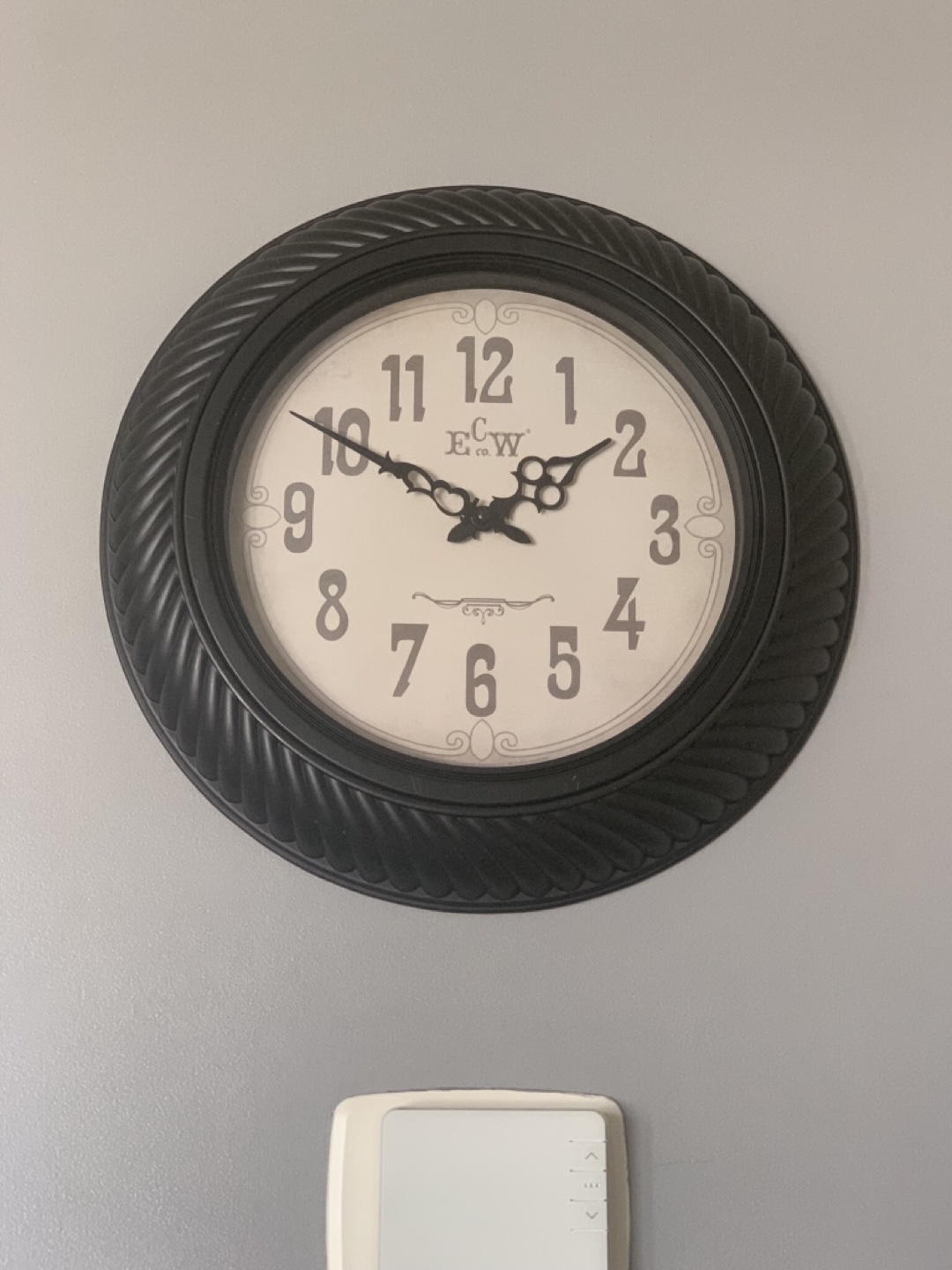 Black Wall Clock with Fancy Hands