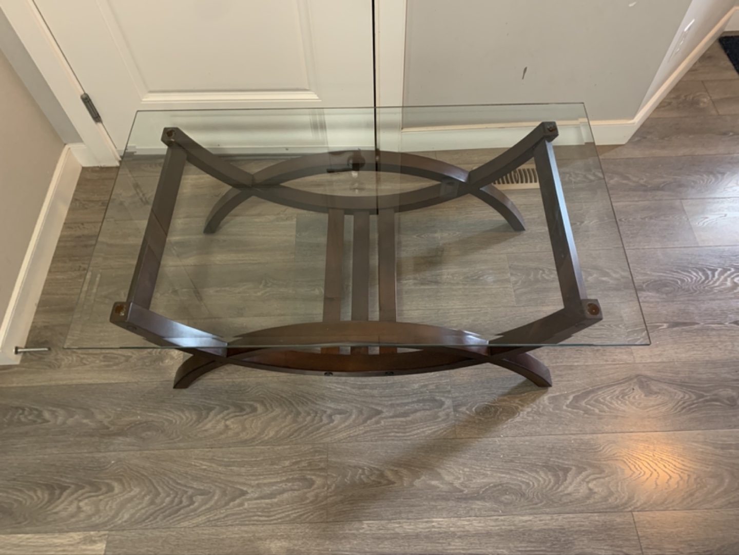 Glass top coffee table with dark brown wooden frame - photo 3