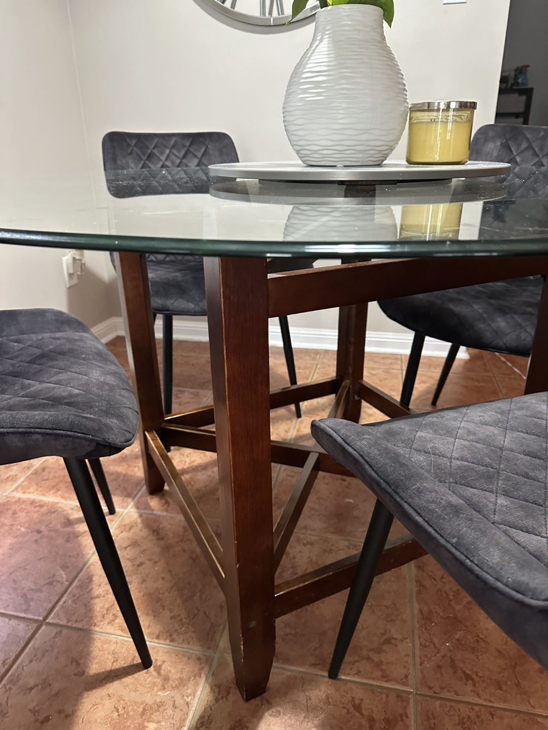 Glass-top dining table