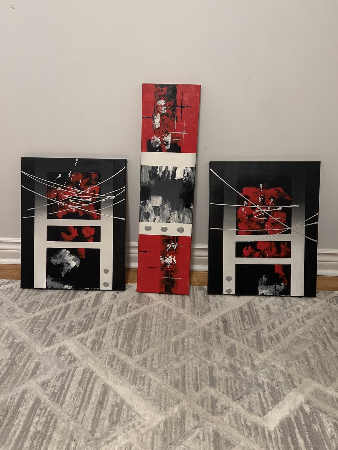 Set of three abstract paintings
