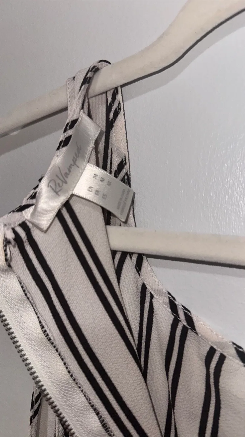 Reimagined Black and White Striped Sleeveless Top image indicator(2)