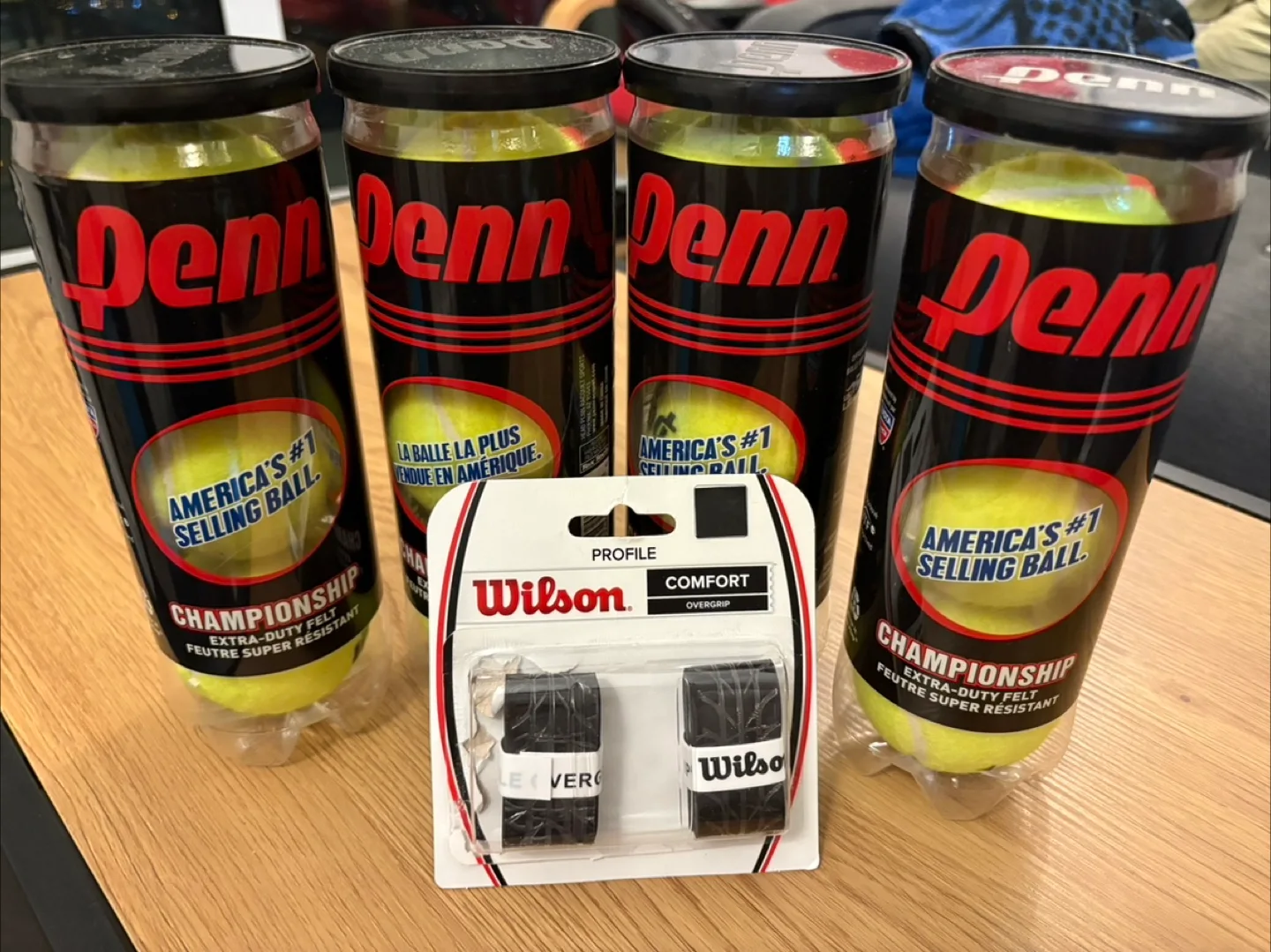 4 cans of Penn Championship tennis balls & 2 Wilson overgrips thumbnail