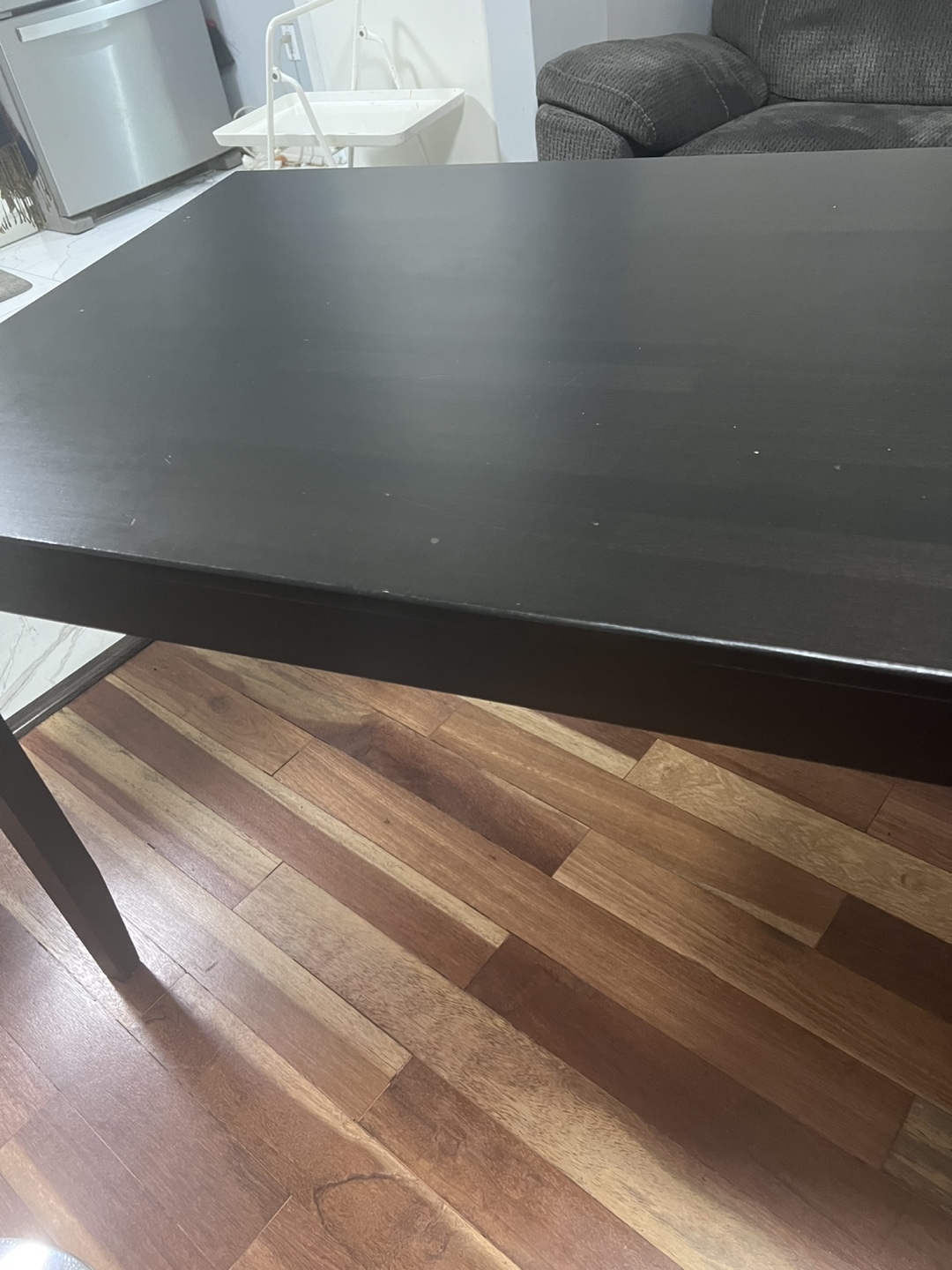 Dark brown rectangular dining table
