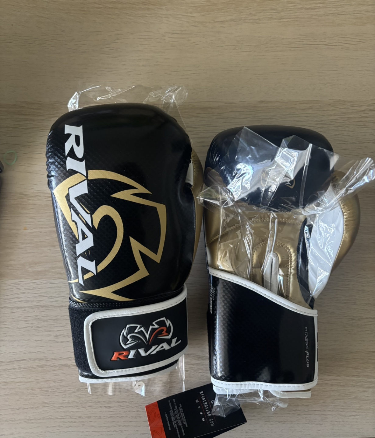 Rival Boxing Gloves - Black and Gold
