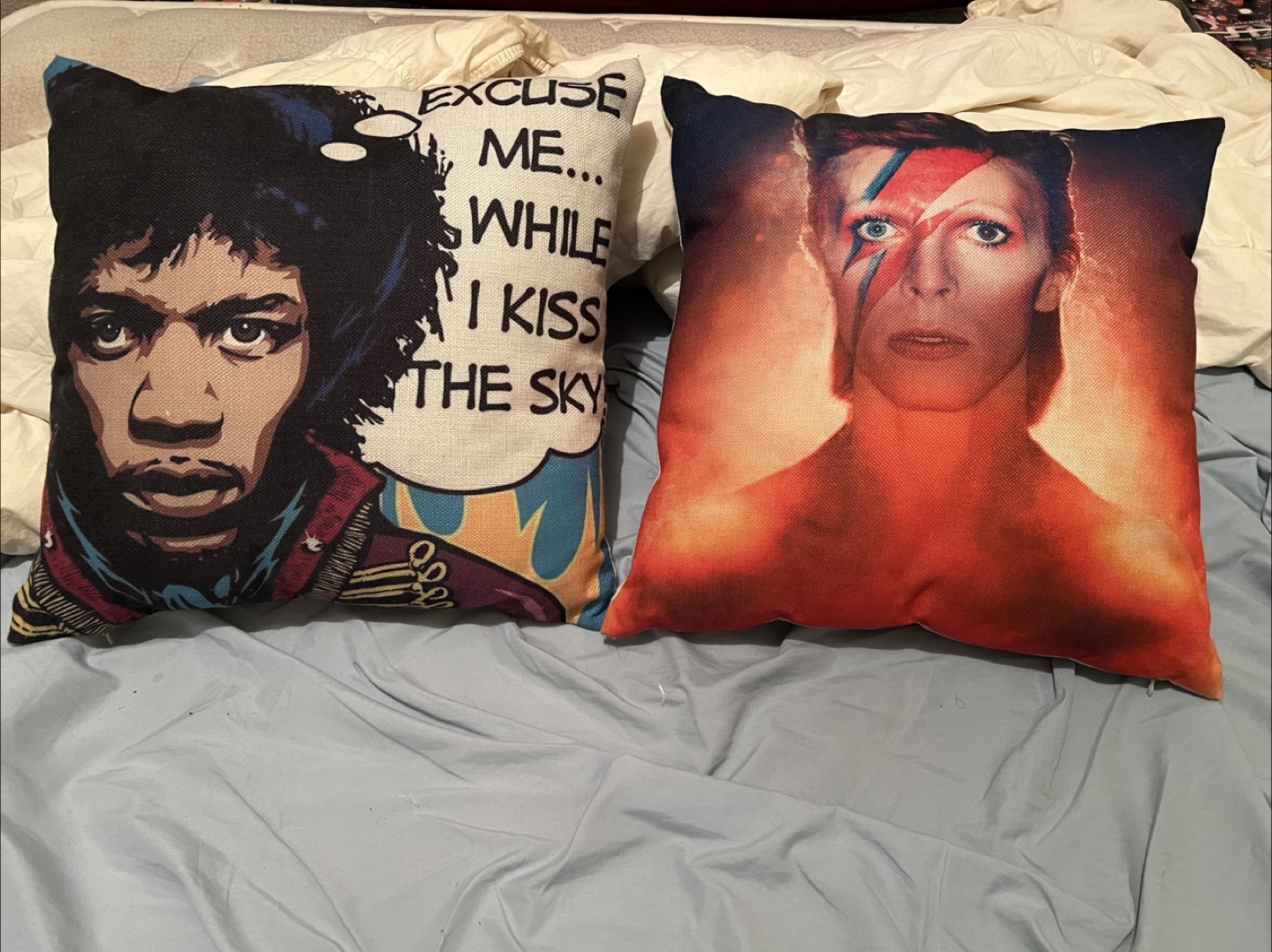 Two decorative throw pillows: Jimi Hendrix & David Bowie