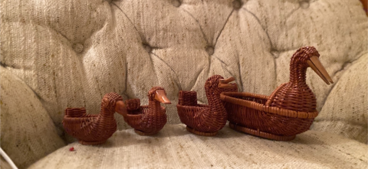 Set of four vintage wicker duck baskets