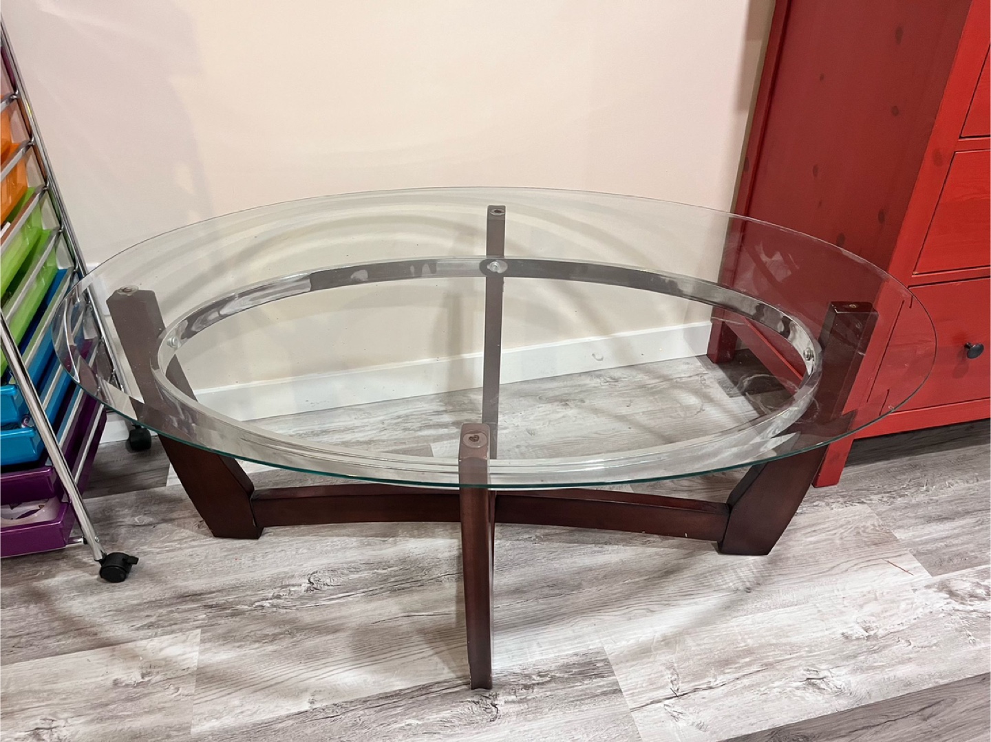 Oval Glass Coffee Table with Dark Wood Base