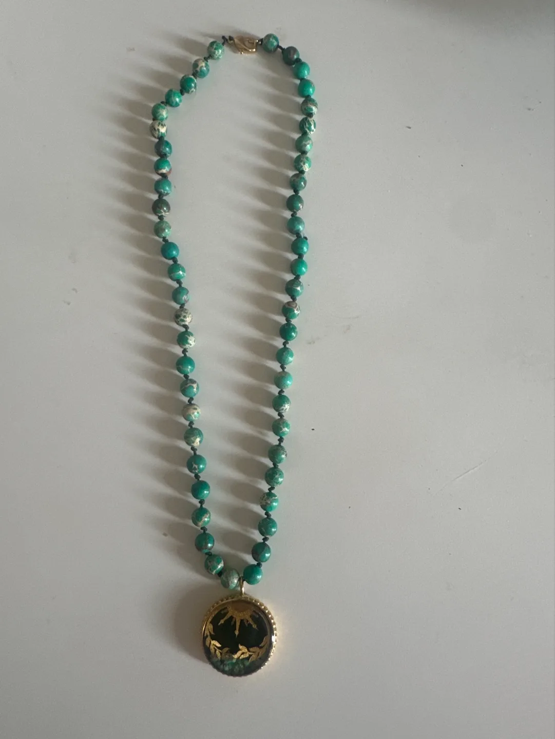 Unique Beaded Necklace with Intricate Pendant thumbnail